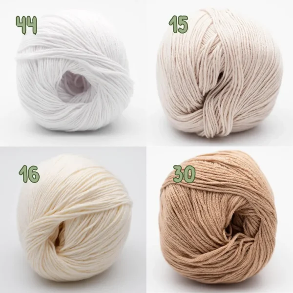 Nuancier de fil coton bio Alba de BC Garn avec les coloris blanc, écru, beige rosé et camel clair.