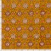 motif indien jaune imprimé sur tissu en voile de coton