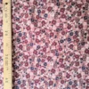 Velours milleraies fleuri Mizet aux fleurs roses, bordeaux et bleu marine sur fond moka, tissu côtelé fin.